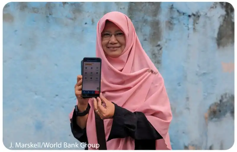 Female showing her Indonesia digital ID